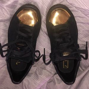 Black and gold Fenty puma